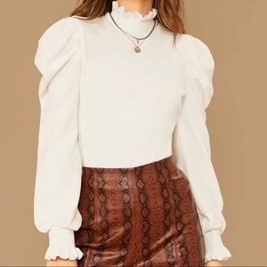Frilled neckline and sleeve top